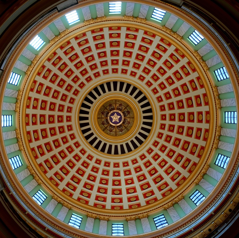      OKJaguar, photographer. "[Oklahoma State Capitol dome, interior view with Great Seal of the State of Oklahoma (5-pointed star in circle) at the center.]" Photograph. 2019. From WikimediaCommons. https://commons.wikimedia.org/wiki/File:Oklahoma_State_Capitol_dome,_interior_view_with_Great_Seal_of_the_State_of_Oklahoma_%285-pointed_star_in_circle%29_at_center.jpg (accessed October 3, 2023). 