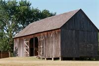 Argo, Jim, photographer. "Peter Conser Home." Photograph. 2006. From The Gateway to Oklahoma History. https://gateway.okhistory.org/ark:/67531/metadc1641283/m1/1/?q=barn (accessed January 9. 2024).