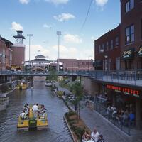 Argo, Jim, photographer. "Bricktown Canal." Photograph. 1999. From The Gateway to Oklahoma History. https://gateway.okhistory.org/ark:/67531/metadc1682453/m1/1/?q=bricktown%20canal. (accessed November 21, 2023).