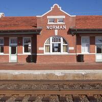 Argo, Jim, photographer. "Santa Fe Depot." Photograph. 2006. From The Gateway to Oklahoma History. https://gateway.okhistory.org/ark:/67531/metadc1689508/m1/1/?q=norman%20oklahoma%20buildings (accessed November 14, 2023).