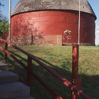 Argo, Jim, photographer. "Arcadia Round Barn." Photograph. 1998. From The Gateway to Oklahoma History. https://gateway.okhistory.org/ark:/67531/metadc1647644/m1/1/?q=barn (accessed January 9. 2023).