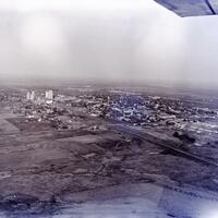 Charles, Chester, photographer. "Aeiral views of Kingfisher and Hennessey." Photograph. 1962. From The Gatewat to Oklahoma History. https://gateway.okhistory.org/ark:/67531/metadc2101024/m1/1/?q=Hennessey%20OK (accessed September 26, 2023).