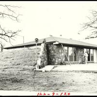 Garrity, H Opal, photographer. "[Photograph 2012.201.b0267.0645.]" Photograph. 1984. From the Gateway to Oklahoma History. https://gateway.okhistory.org/ark:/67531/metadc366363/m1/1/?q=earth%20sheltered (accessed February 6, 2024).